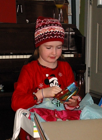 Emily opening a present